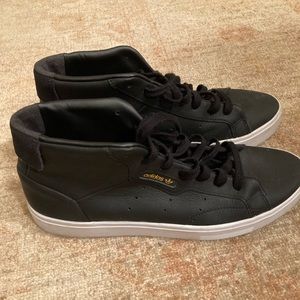 Women’s black leather adidas high tops size 9 1/2